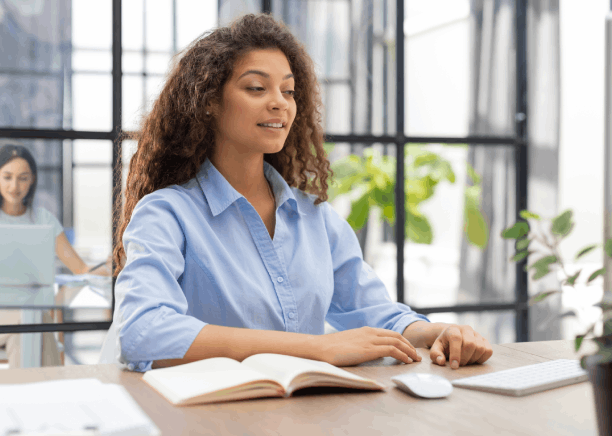 A linguist checks Brazilian Portuguese regional wording on screen, delivering Portuguese Translation Services in Florida.