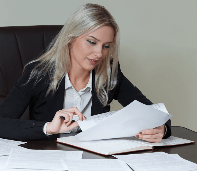 Project manager reviews documents and prepares a free estimate for certified Translation Services in Hialeah at a local.