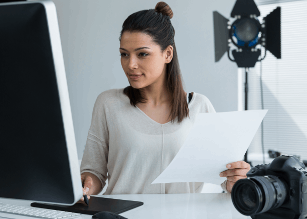 Certified media women handling Media Translation Services for official media documents with accuracy.