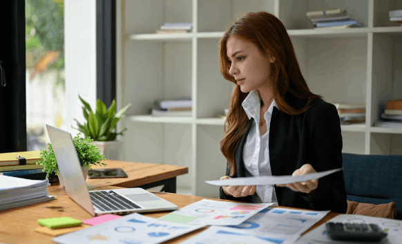 A translator reviews a birth certificate beside a notary seal, offering Translation Services in Hialeah with certified.