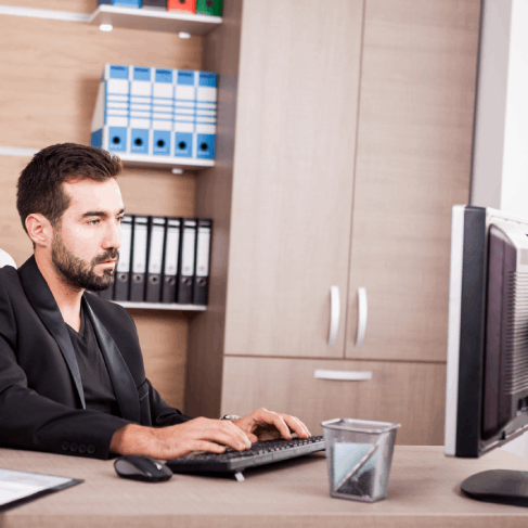 A translator edits a manufacturing safety manual, providing French Translation Services in Florida for industries.
