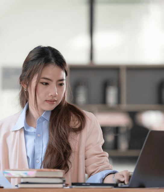 Translator works on specialized document translation in Miami Beach, including birth and marriage certificates.