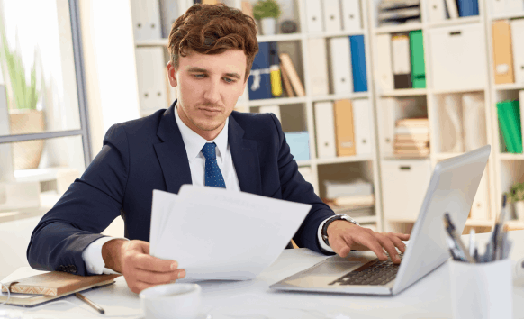 A translator stamps an urgent document after a final check, delivering quick Translation Services in Hollywood.