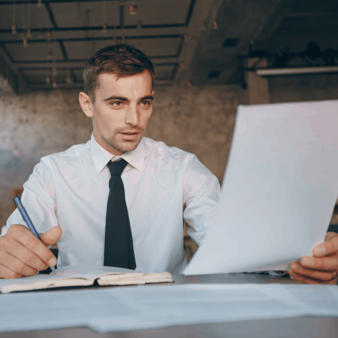 A technical writer compares an English and Spanish product manual, using Translation Services in Hialeah for technical.