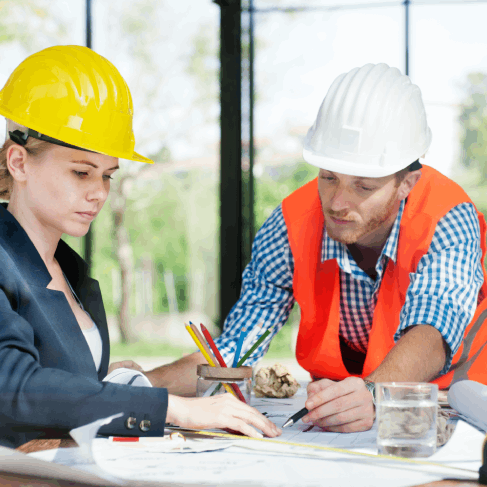 An engineer reviews a translated schematic with Translation Services in Hollywood, ensuring technical industry terminology.