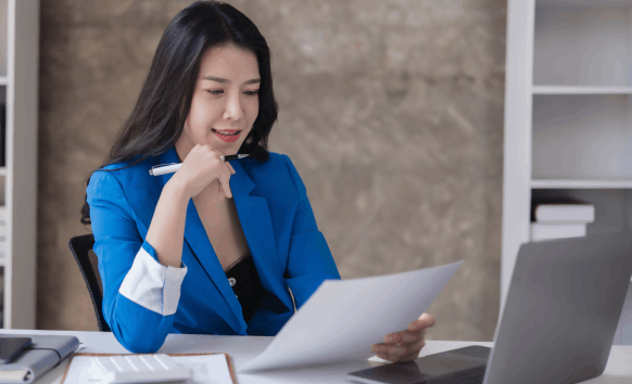 Translator following strict translation processes and quality standards to ensure certified Birth Certificate translations.