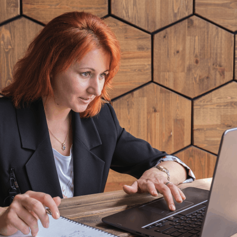 A translator checks a birth certificate packet for USCIS compliance, using Translation Services in Pembroke Pines.